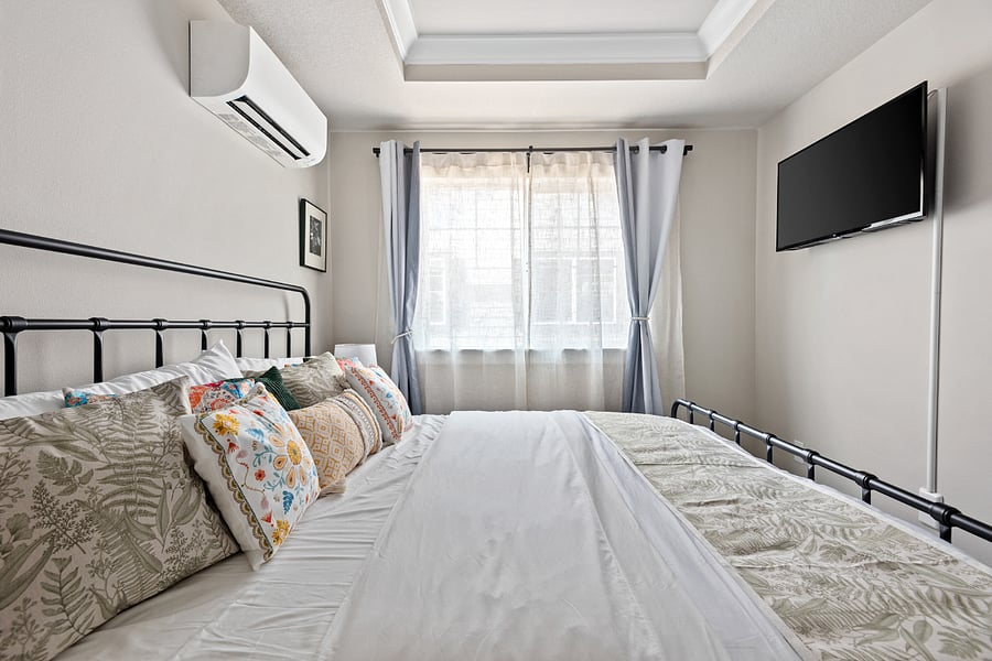 Upstairs king bed and television