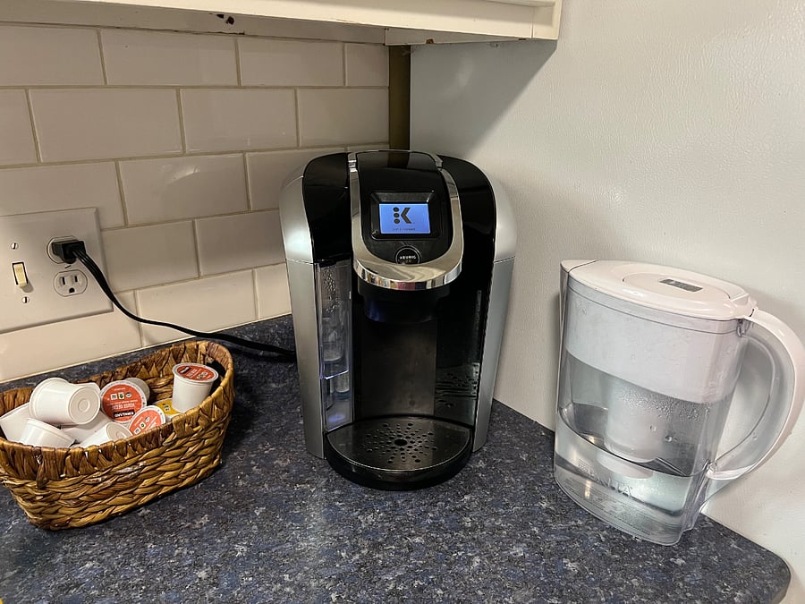 Keurig coffee maker. There is also a drip coffee maker and a French press in the pantry. Other appliances include, microwave, toaster oven, toaster, and blender.