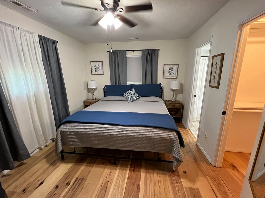 King bedroom has blackout curtains and blackout rollershades. There is a walk-in closet. The master bathroom is newly renovated.