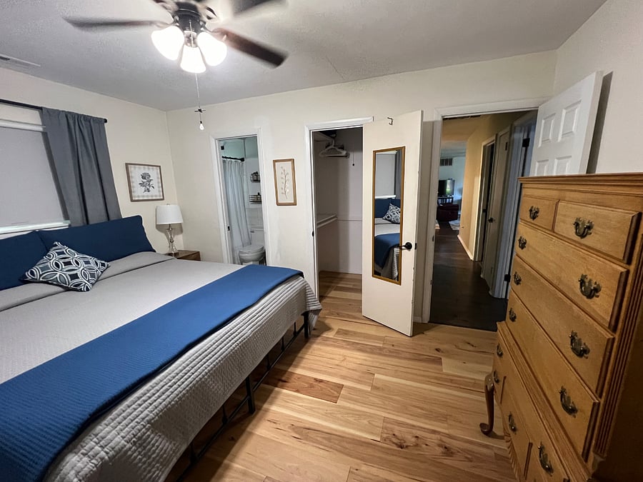 King bedroom has blackout curtains and blackout rollershades. There is a walk-in closet. The master bathroom is newly renovated.