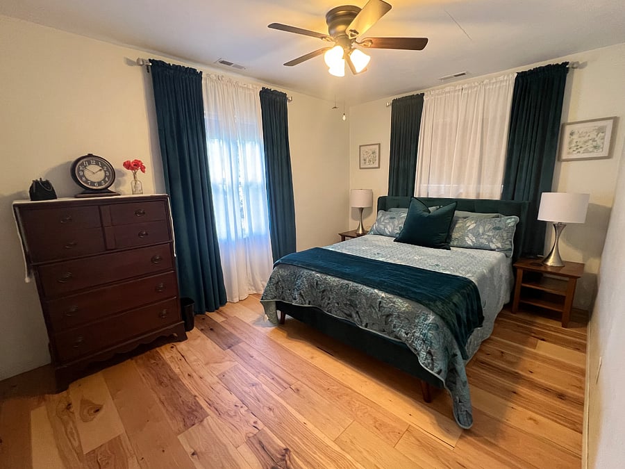 The queen bedroom has blackout curtains and blackout roller shades. There is a roomy closet (not pictured).