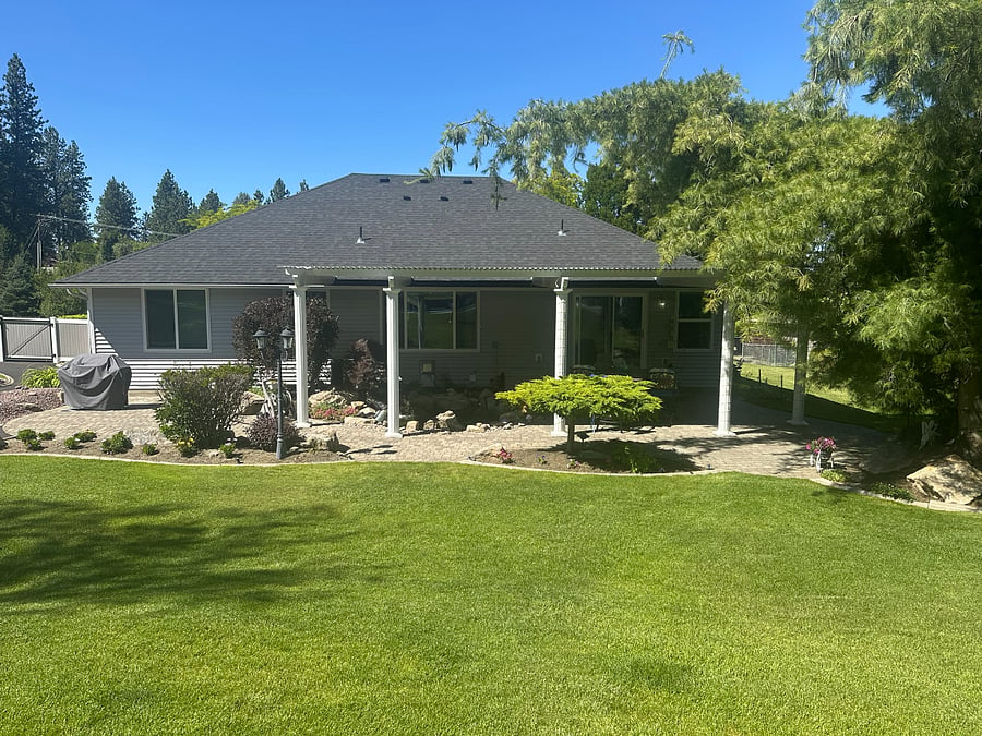 View of back of house and patio.