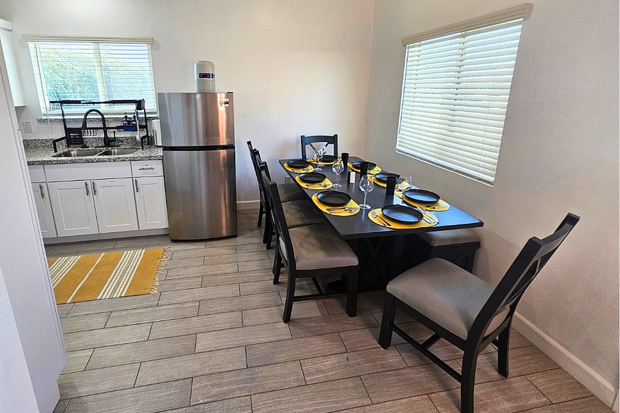Insert the extra leaf in the dining table for seating for 8!