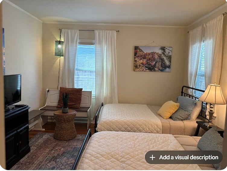 Shared bedroom with full sized beds, tv, closet