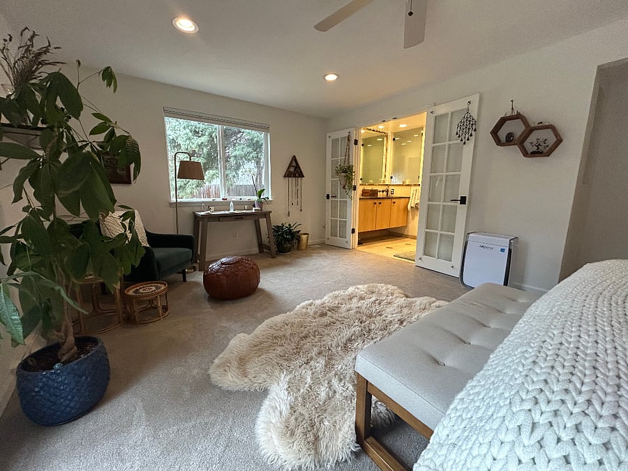 Master bedroom with sheepskin rugs.