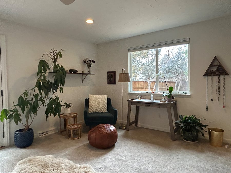 Master bedroom with plants, privacy, and tree views. Small work station.