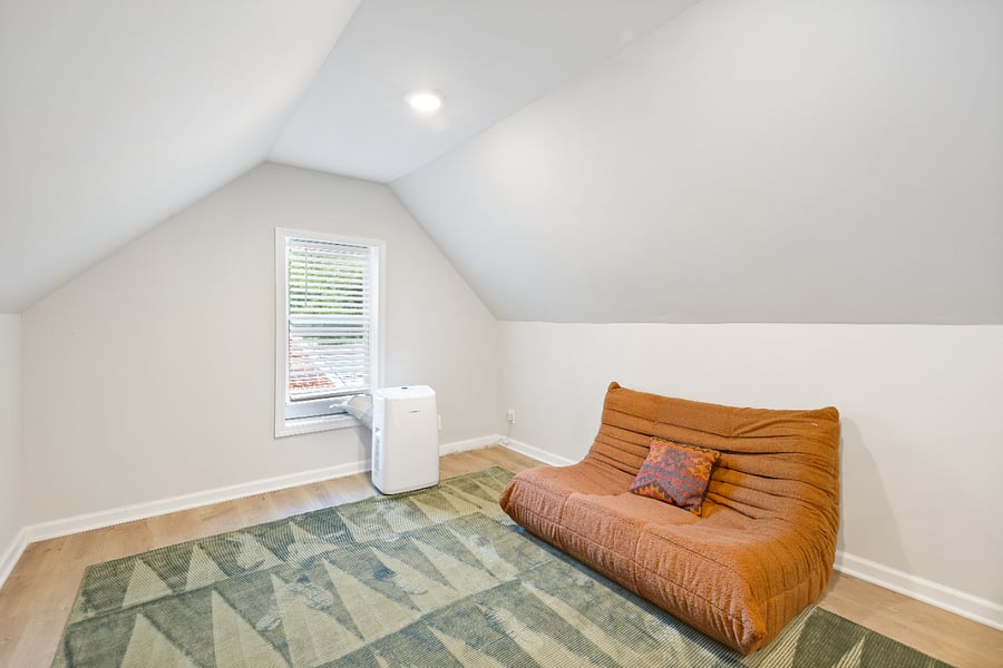 attic sitting room (where twin bed cot could be used)