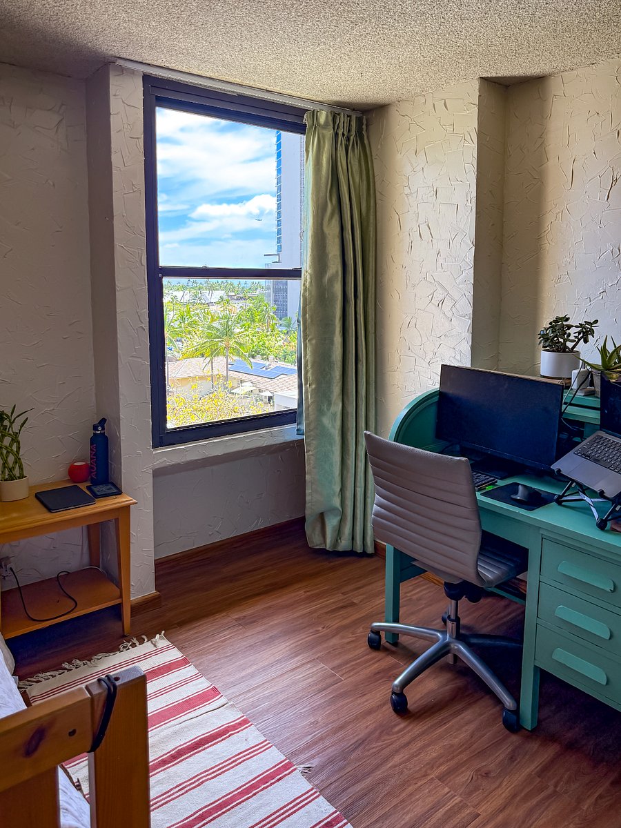 The bedroom for rent has a similar view as the living room.