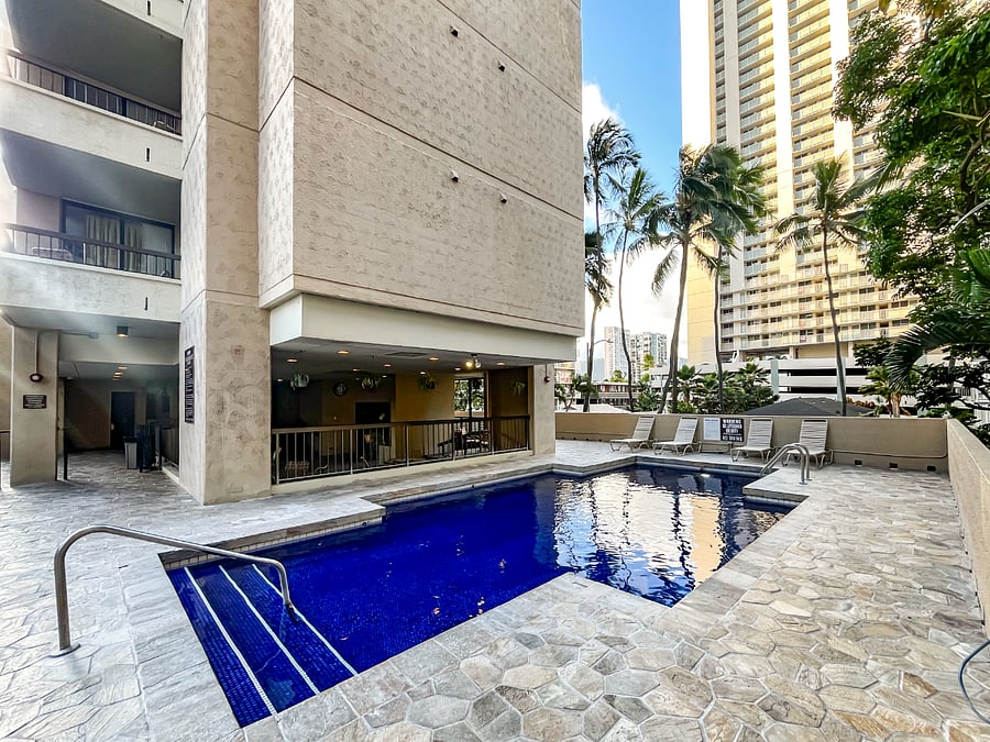 The heated pool is partially shaded.
