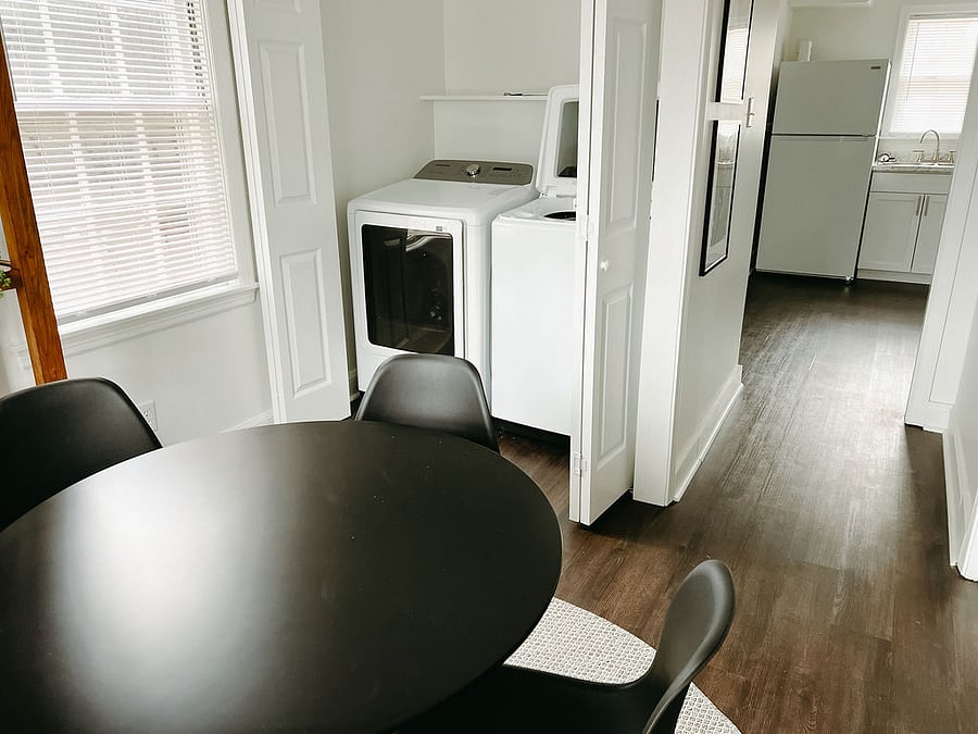 Keep your wardrobe fresh with our large-capacity washer and dryer, making extended stays a breeze.