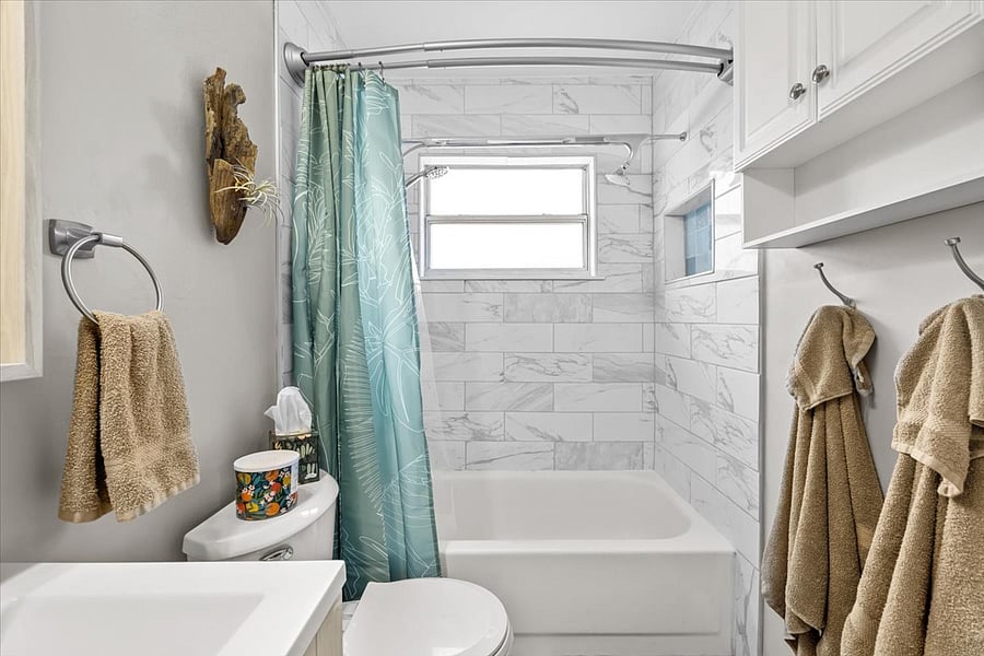 Full sized bathtub with dual shower head