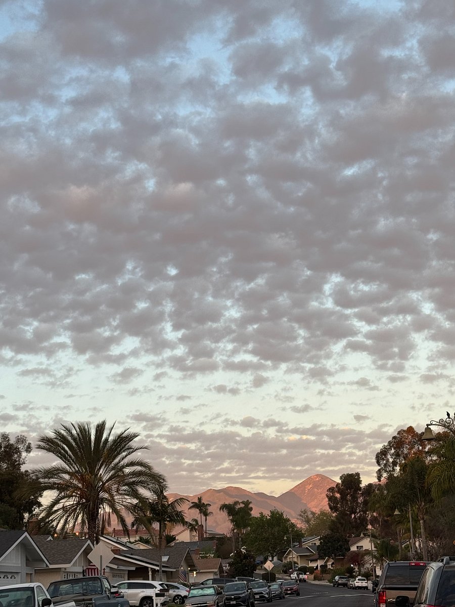 Watch the sun kiss Saddleback Mountain from your quiet Mission Viejo streetwhere evening strolls meet golden skies and every sunset feels like home.