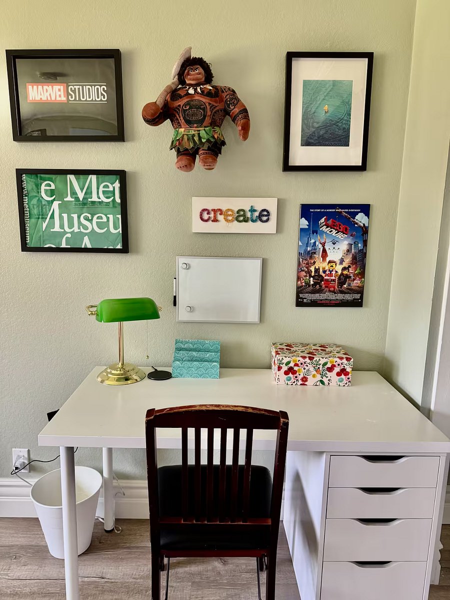 This dedicated desk area offers a quiet place to write, read, or work, with cheerful wall art and drawer space to keep things tidy. A great setup for both focus and inspiration.