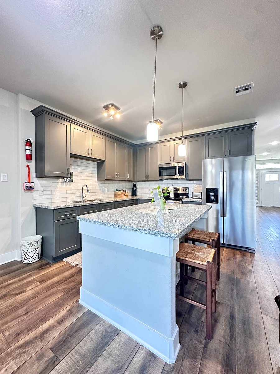 Fully furnished identical kitchen with brand new stainless steel appliances in both the units A and B