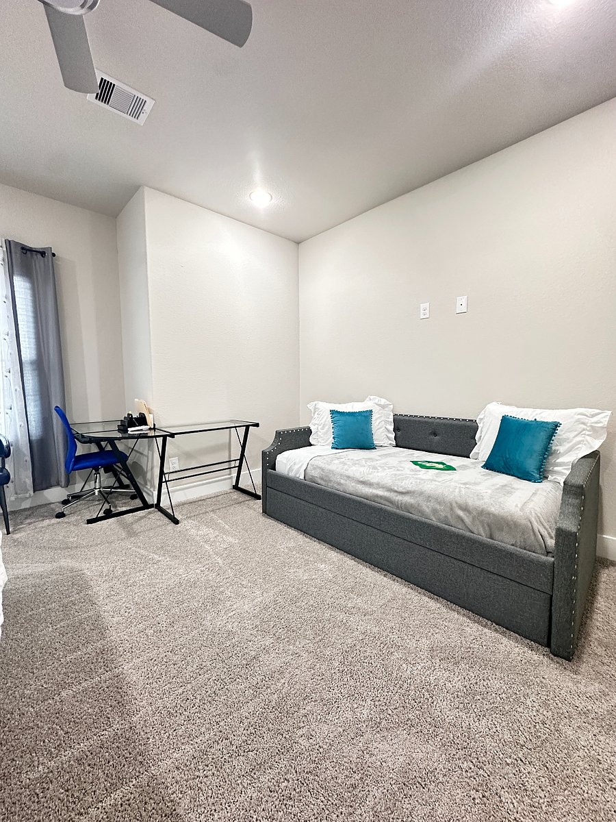 Unit A - 2nd Floor - Bedroom 2, King size bed,  work station, twin day bed, closet and private attached bathroom