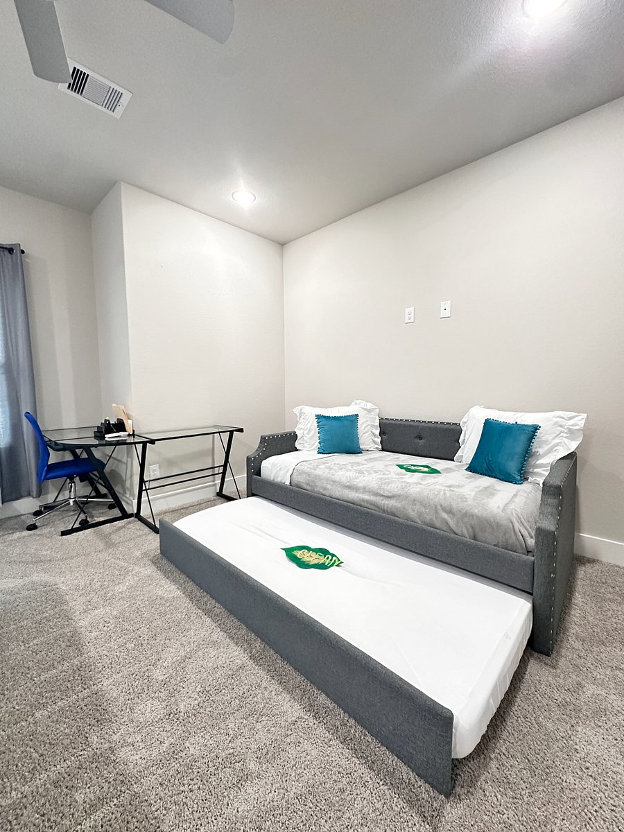 Unit A - 2nd Floor - Bedroom 2, King size bed,  work station, twin day bed, closet and private attached bathroom