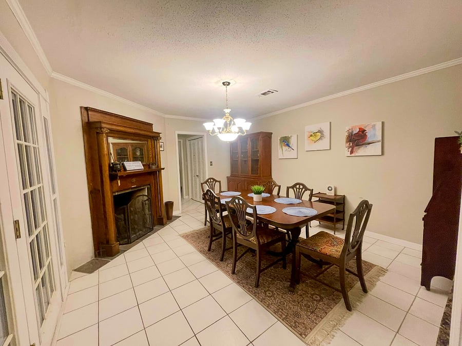 Dining room with antique fireplace (non-operational)