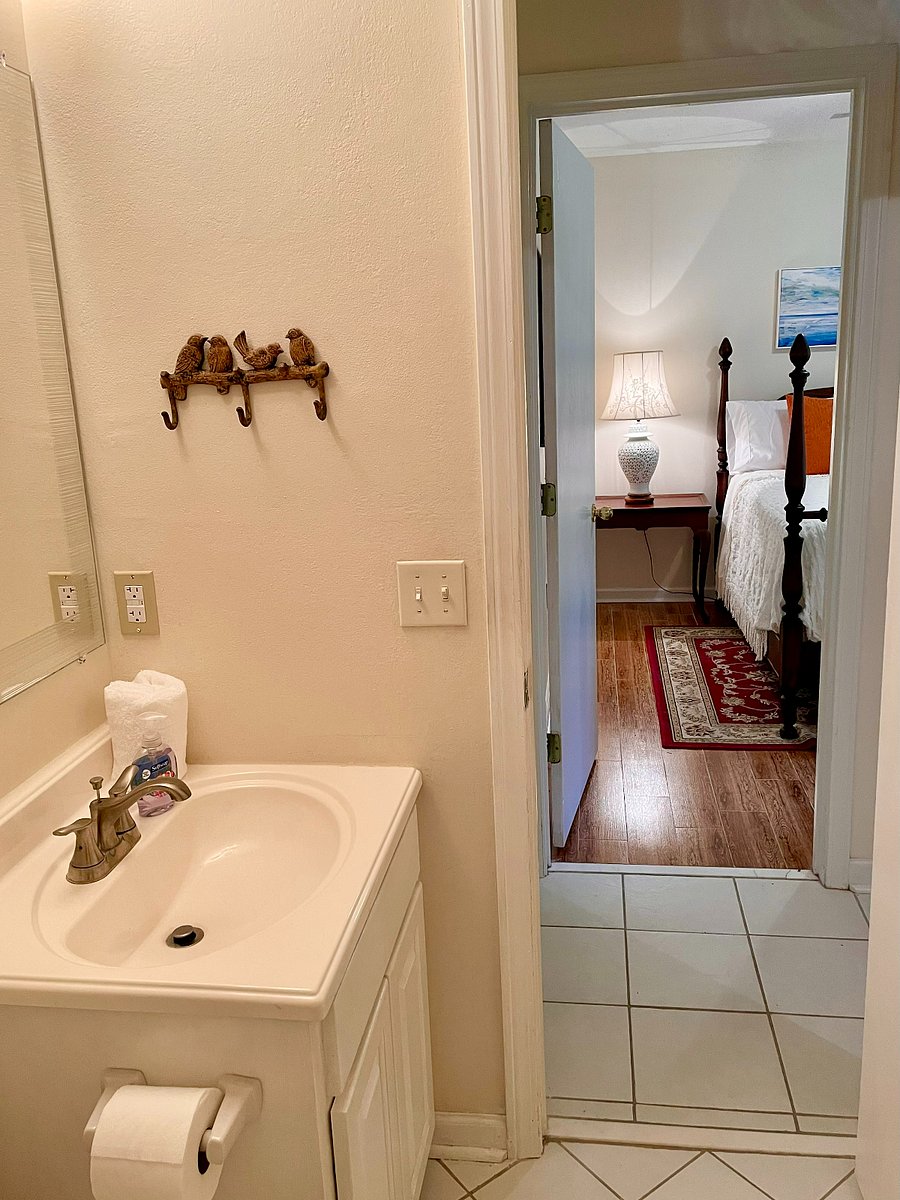 Bathroom next to full bedroom