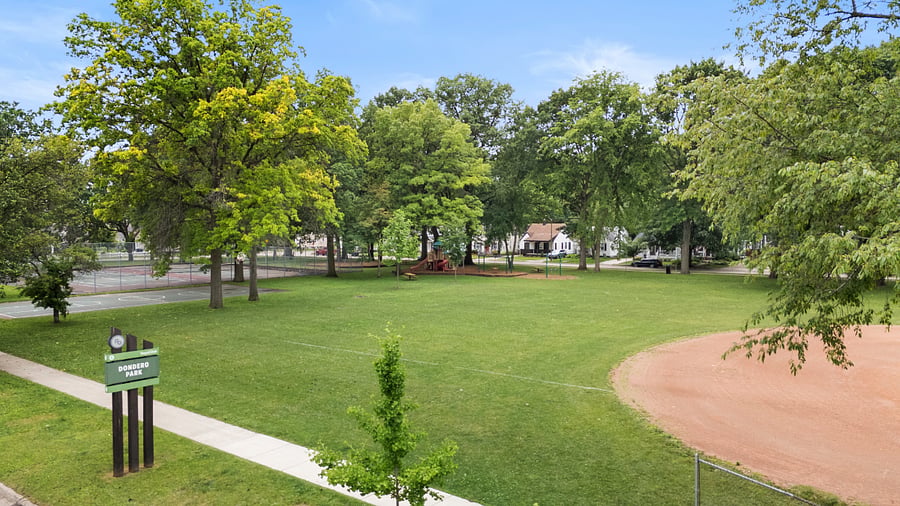 Enjoy privacy with a convenient park located across the street with a tennis court, basketball court, baseball/softball diamond, kids' playground, and picnic tables steps away!