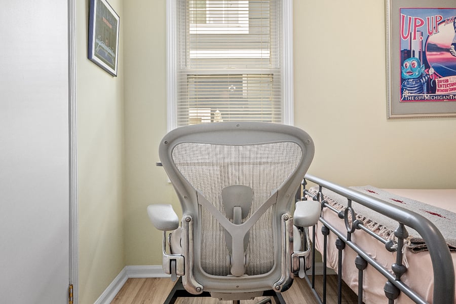 Small typewriter desk located in Bedroom 3. Sit back in an Aeron Fully Loaded Adjustable Lumbar - Titanium - By Herman Miller.
