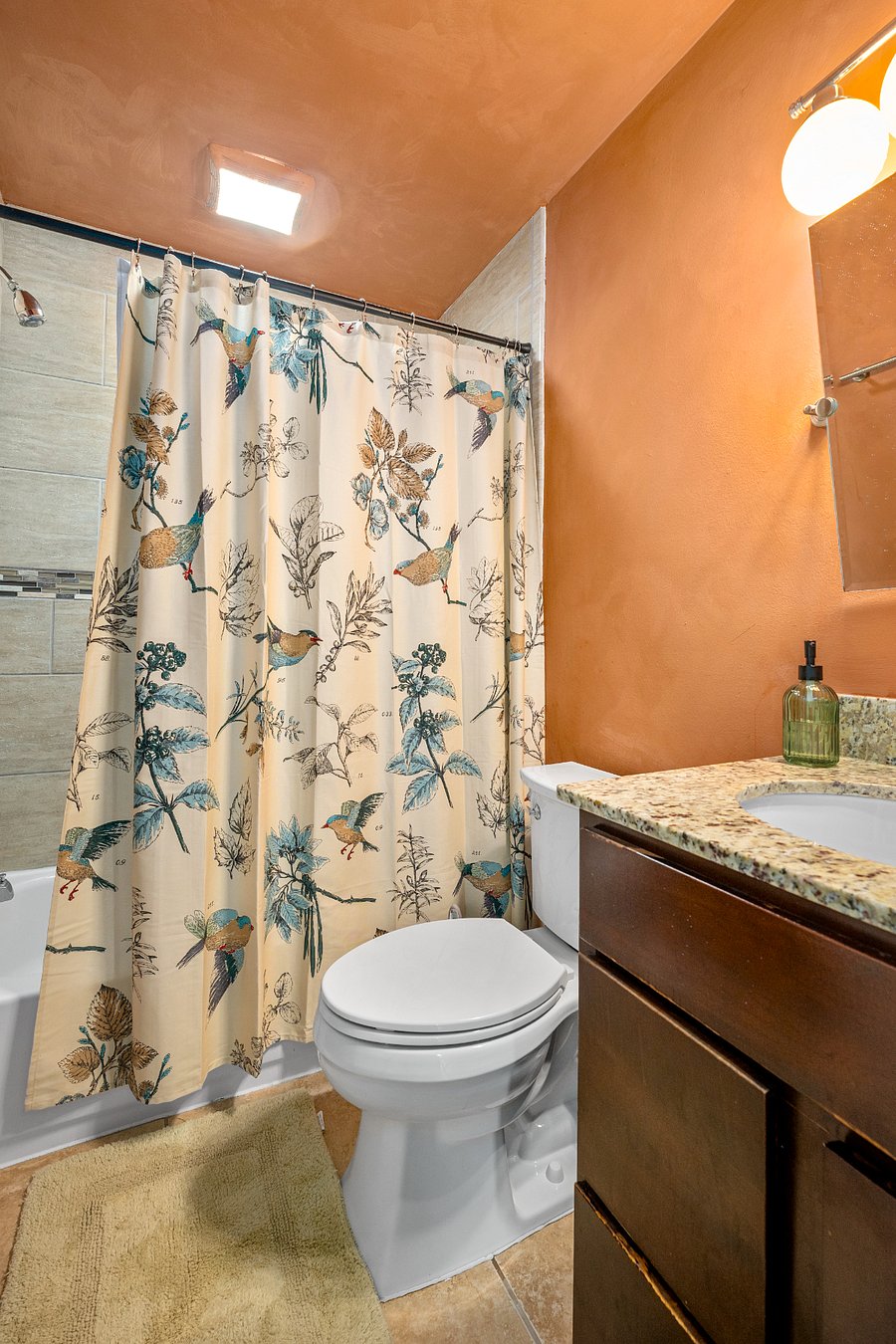Shower and tub. Hand-painted, luxe limewash walls. Starter essentials and cleaning products included.