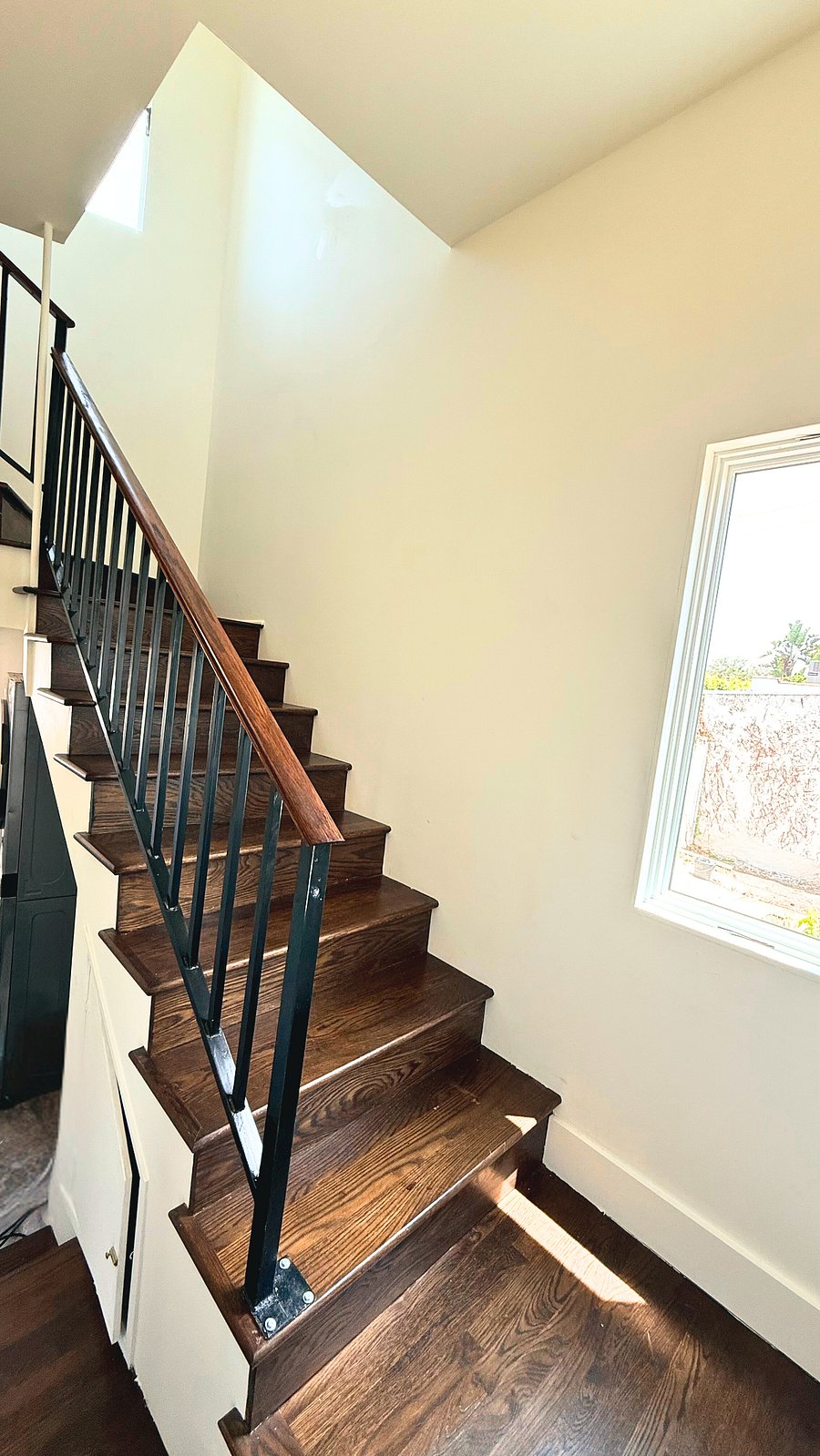 Private entry & stairwell leading to the unit