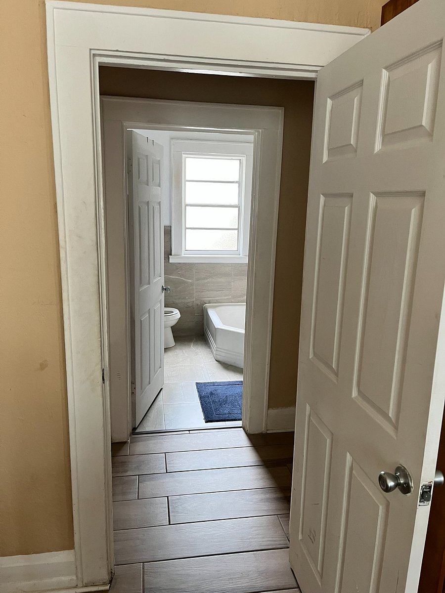 Downstairs bathroom between bedroom #2 and #3 