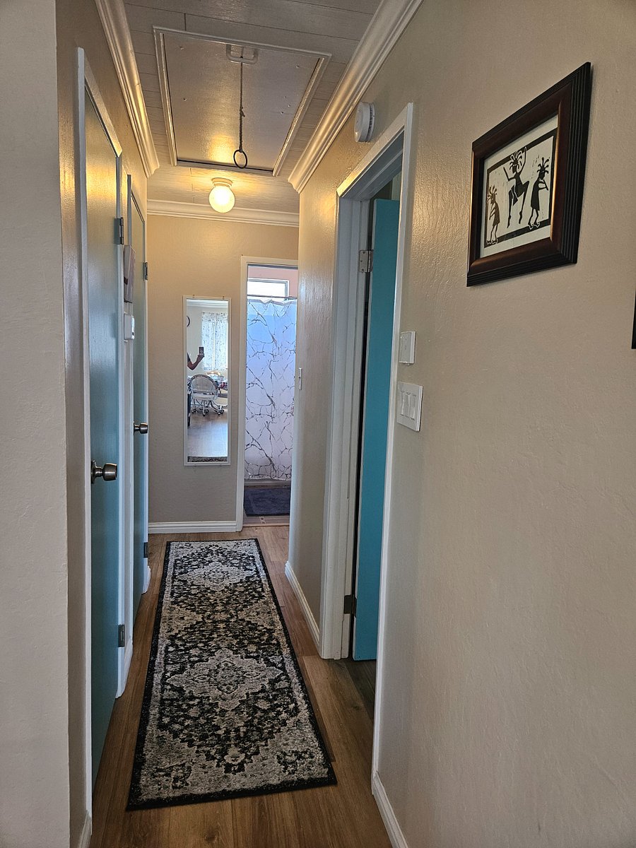 Upstairs hallway leading to bedrooms and bath
