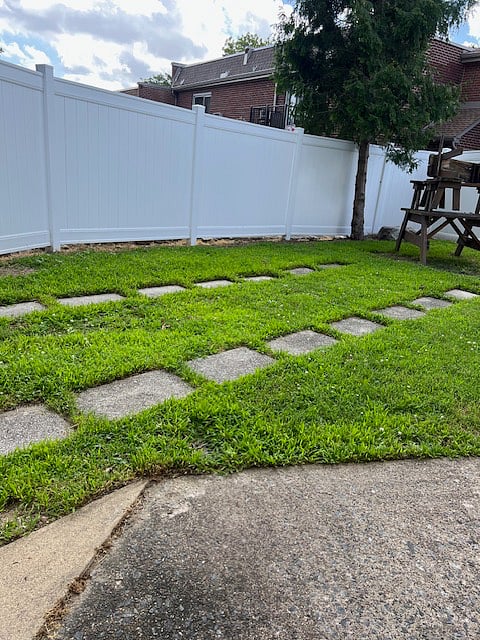 Back enclosed yard, with parking option.