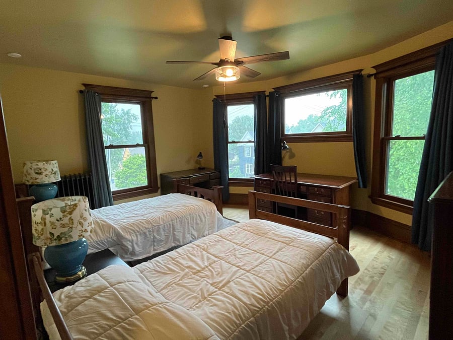 Master bedroom, shown with two twin beds (view 1). A queen bed can replace the two twin beds, by request. Sleeps two people.