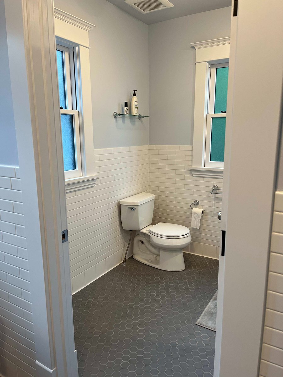 The toilet in the second floor bathroom. This room also has the walk-in shower and can be closed off from the vanities.