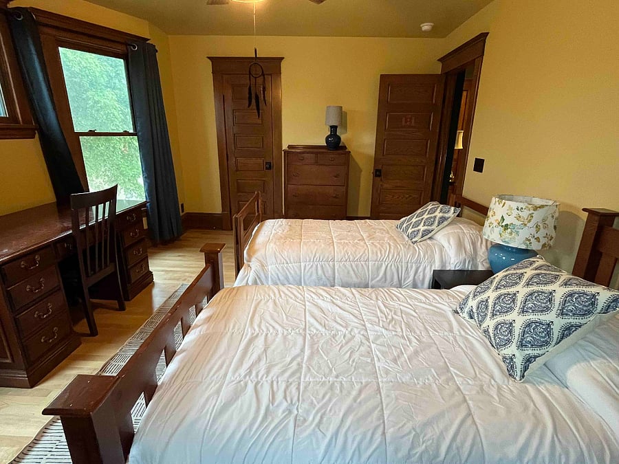 Master bedroom, shown with two twin beds (view 2). A queen bed can replace the two twin beds, by request. Sleeps two people.