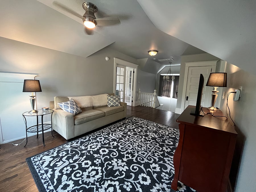 Attic Suite: Sitting room with queen-sized pull-out sofa.
