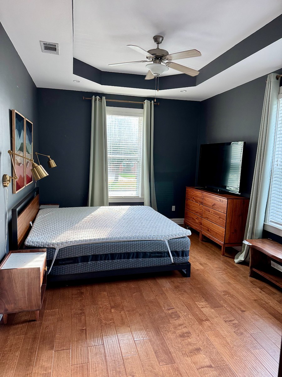 Master bedroom. Black out curtains. 55 inch TV with fire stick. King size bed with Layla hybrid mattress and topper. Will update photo with bedding soon.