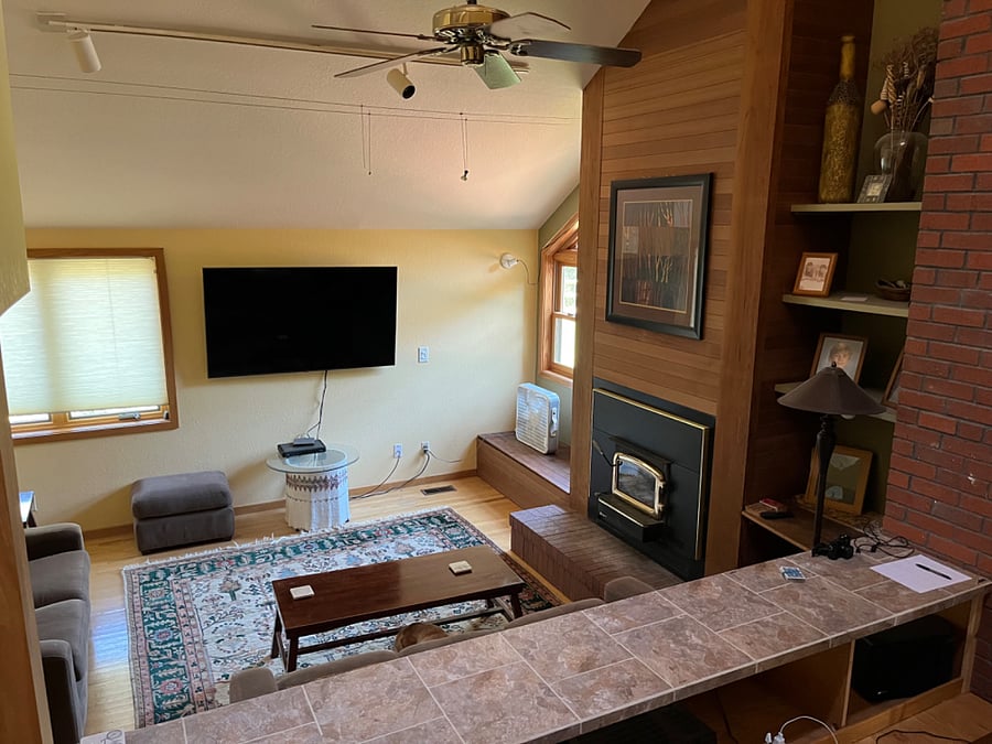 Living room is 3 steps down from dining room