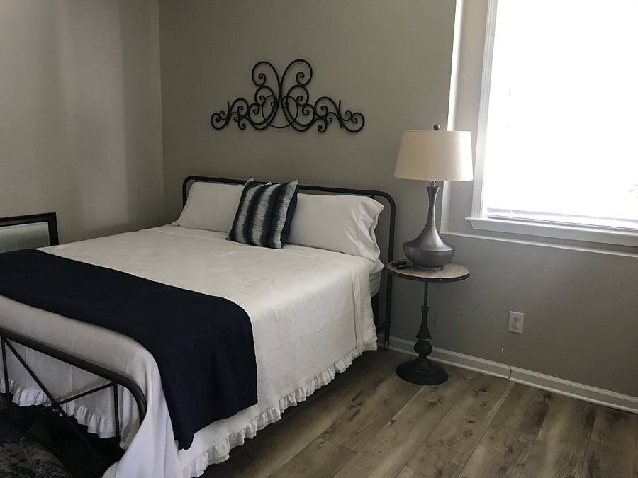 King bed in large room w/ smart TV and plenty of closet space.