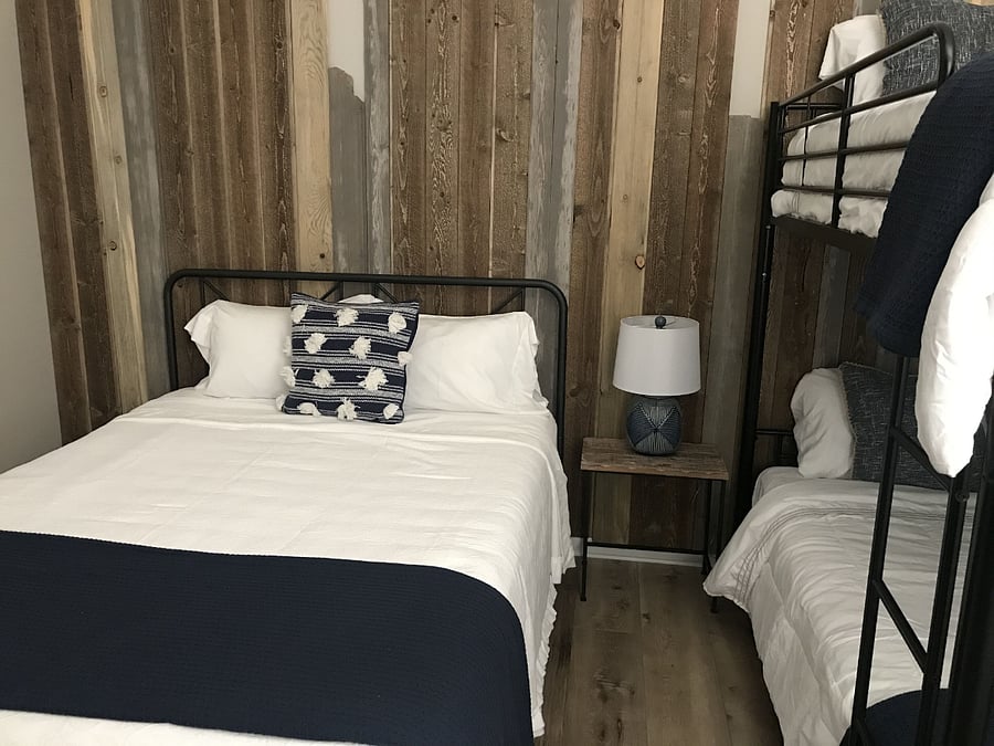 Secondary bedroom with Queen bed and bunk beds.
