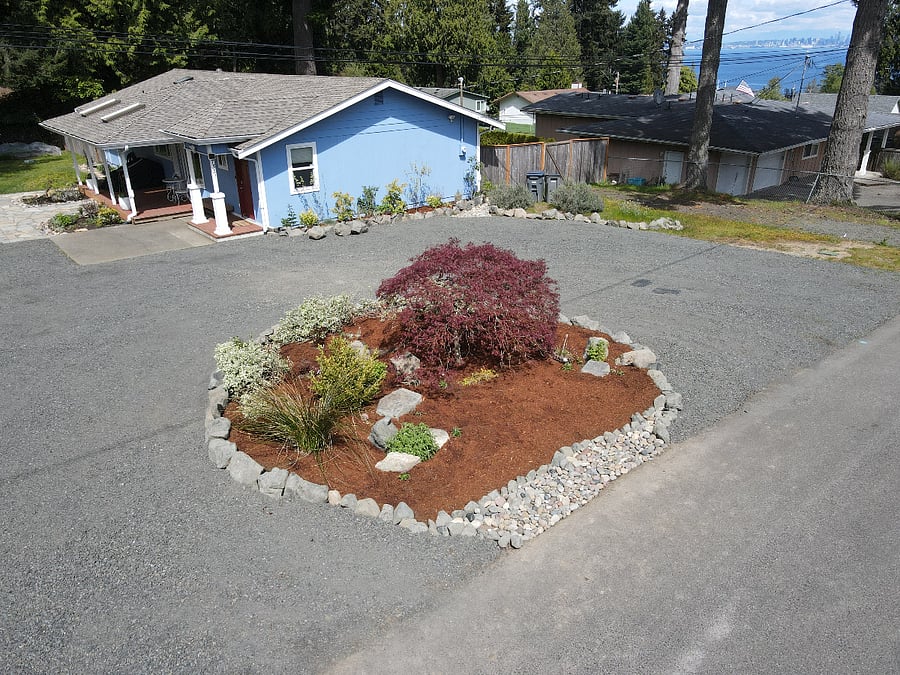 Beatifully landscaped with mature lace leaf maple trees.  Plenty of parking on the circle drive.