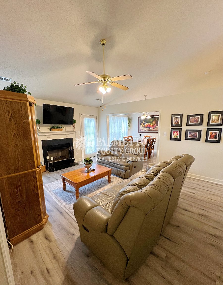 Living room with smart TV and fireplace