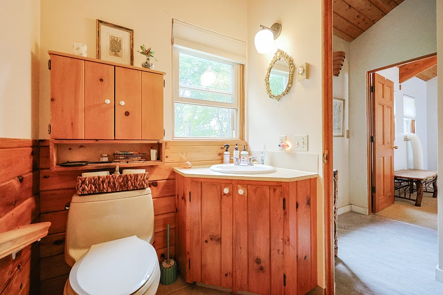 Second floor bathroom including tub/shower and safety bars