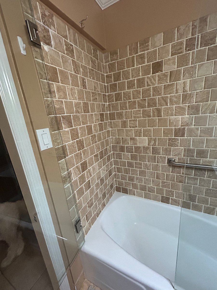 Tiled shower with handicap handles