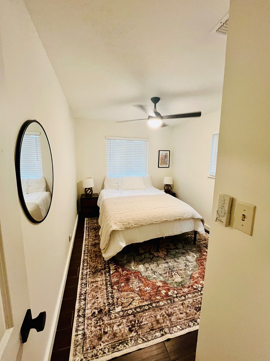 Primary bedroom with queen bed and large closet