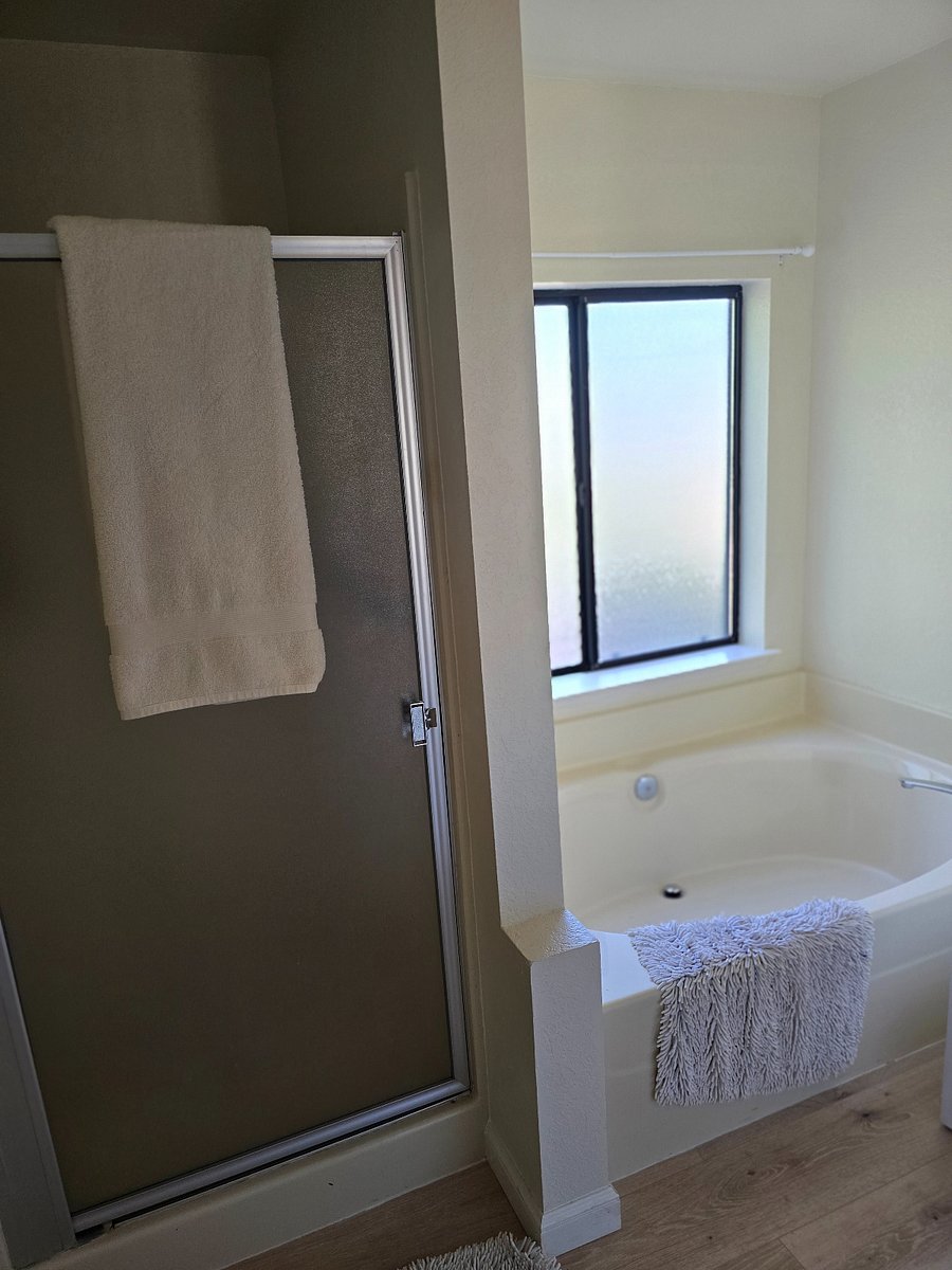 Master bath with shower and bathtub