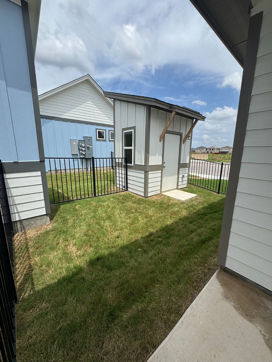 Backyard with storage shed