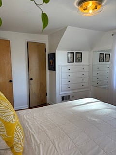 S facing bedroom drawers & closet door
