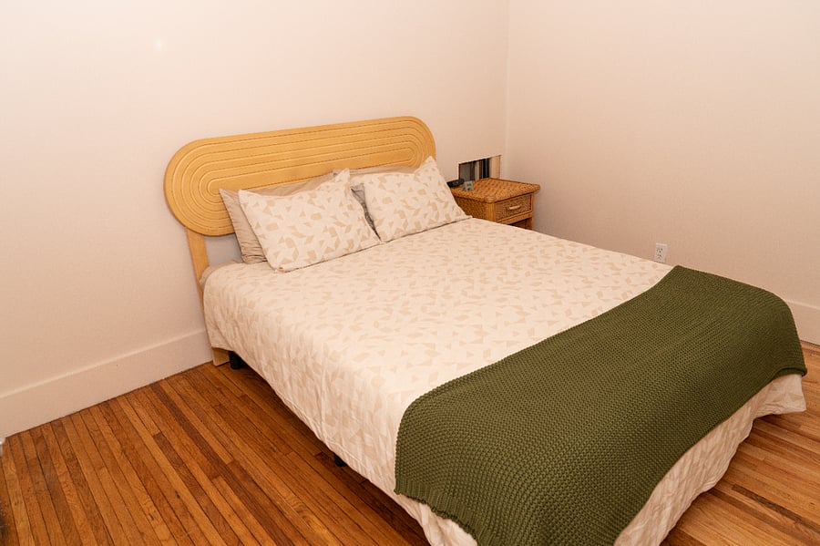 The second bedroom features a brand new queen size bed. 