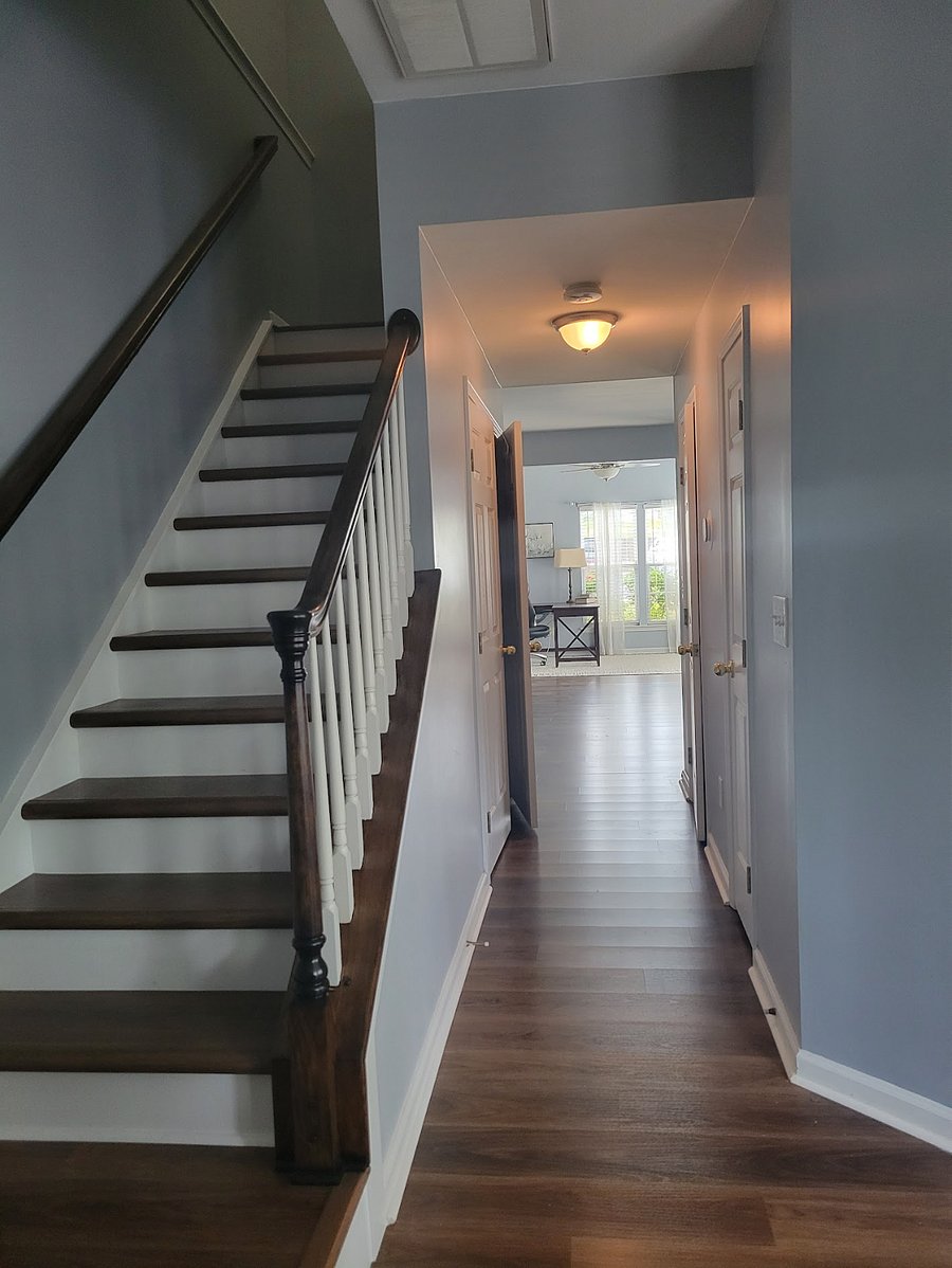 Stairway to the left when entering the front door