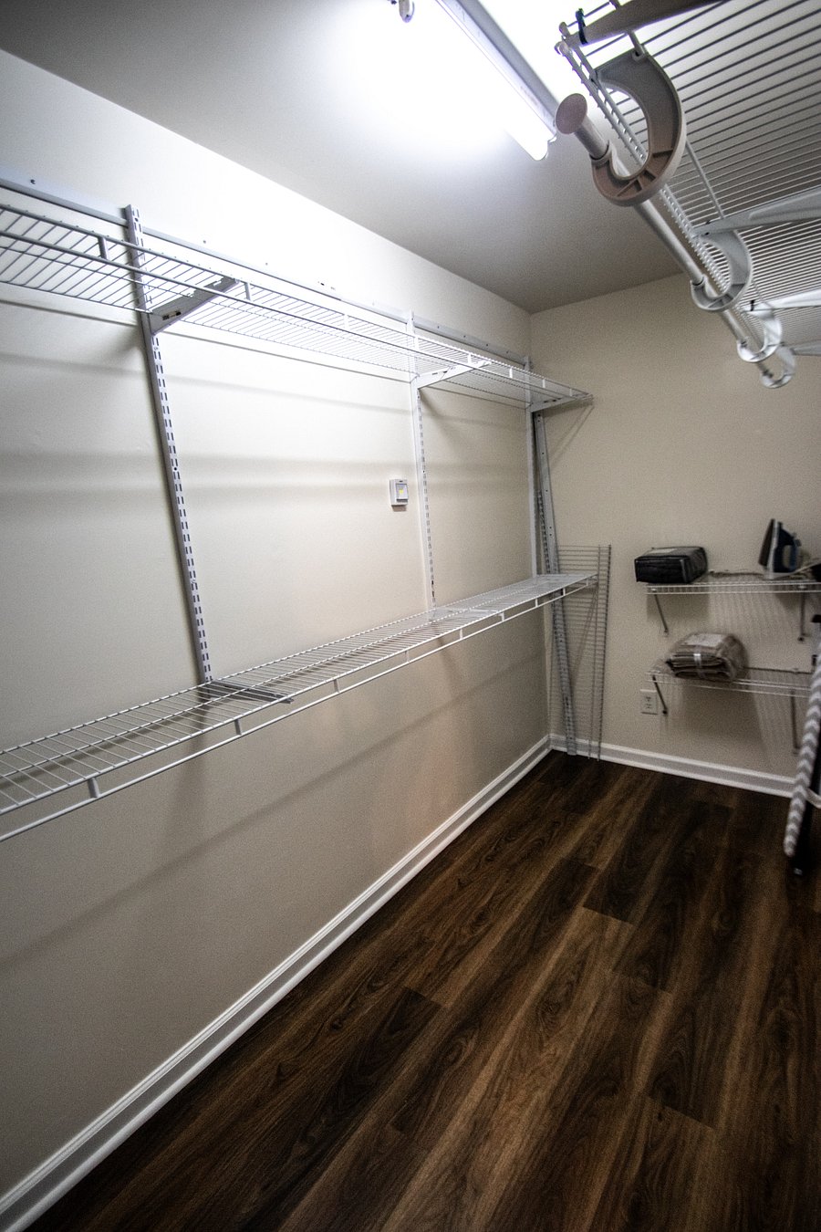 large walk-in closet in master bedroom