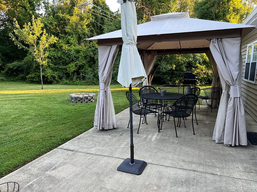 Backyard patio Gazebo with table and chairs, grill and fire-pit