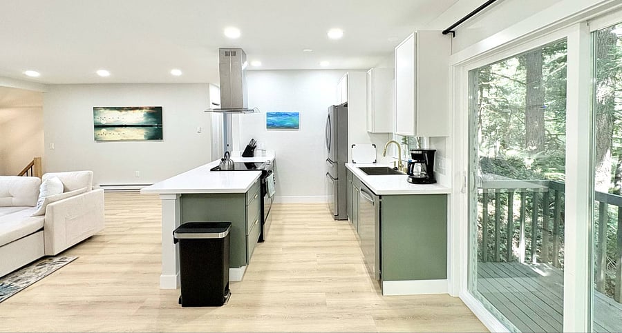 Brand-new modern kitchen with sleek stainless steel appliances, stylish cabinets, and durable countertops, perfect for a comfortable and convenient stay.